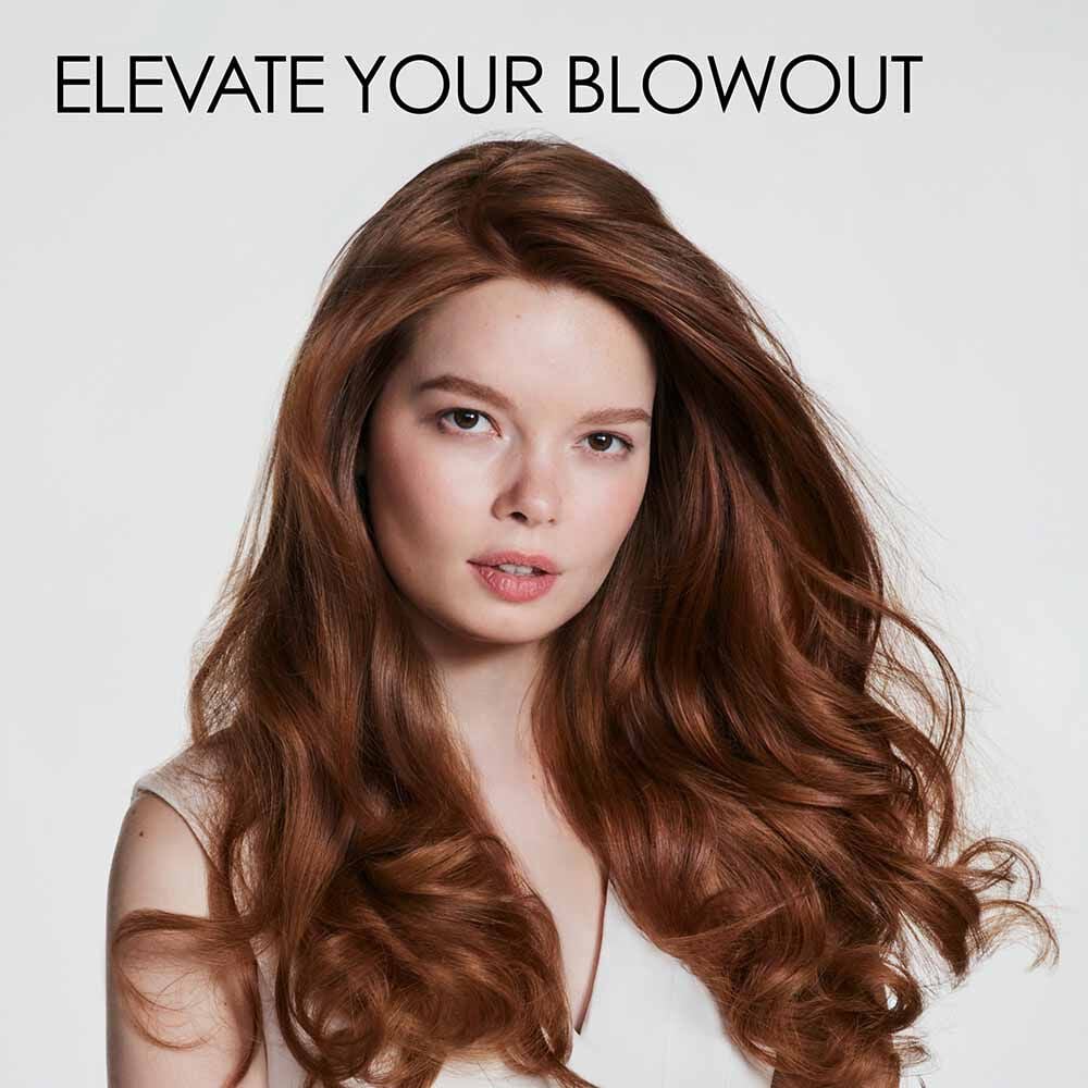 Olaplex Volumizing Blow Dry Mist - image of product with model