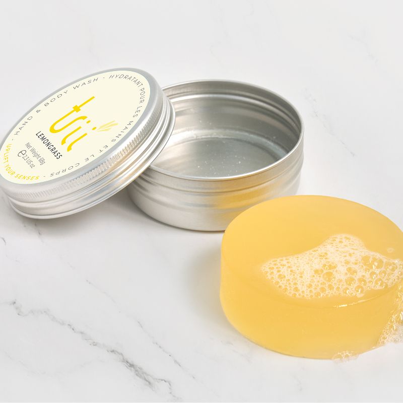 Trii Lemongrass Hand Body Wash Bar - lifestyle image of product and tin